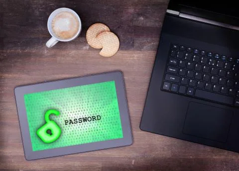 Tablet on a desk, concept of data protection Photos