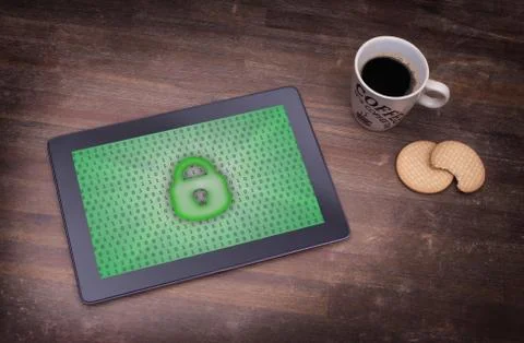 Tablet on a desk, concept of data protection Photos