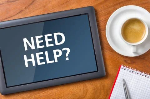Tablet on a desk - Need help 스톡 사진