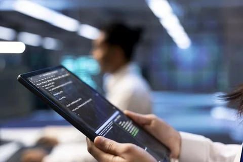 Tablet, diagnostics and technology in closeup at data center Stock Photos