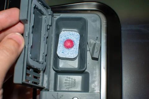 Tablet in the dishwasher tank Stock Photos