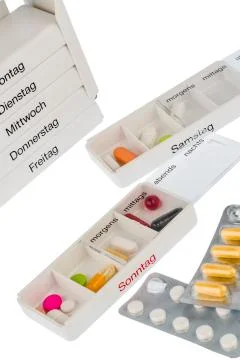 Tablet dispenser and tablets Stock Photos
