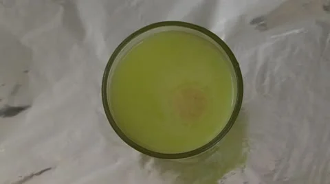  The tablet is dissolved in water with bubbles. View from above. Stock Footage 10825577