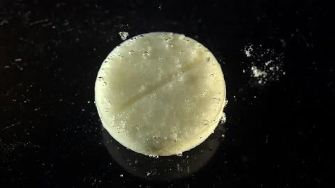 Tablet Dissolves In Liquid. Timelapse Stock Footage 186744934