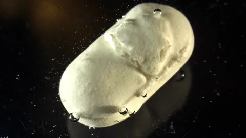 Tablet Dissolves In Liquid. Timelapse Stock Footage 186762910