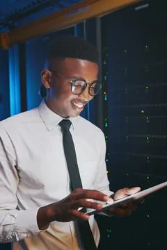 Tablet, engineer or happy black man in server room for firewall upgrade Stock Photos