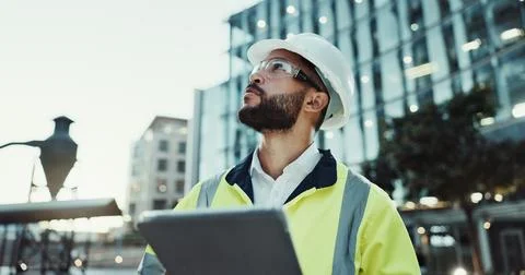 Tablet, engineer thinking and man in city for building, planning and development Fotos de archivo