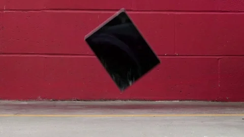 Tablet falling on corner Video stock 75404664