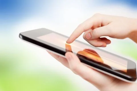 Tablet in girl hands Фото