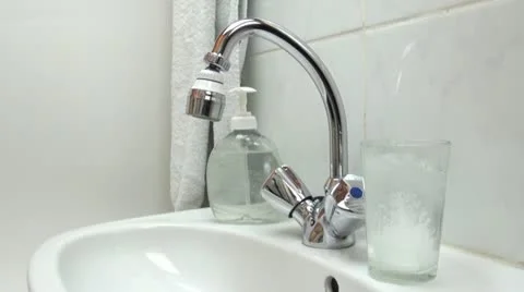 Tablet in a glass of water Stock Footage 12353975
