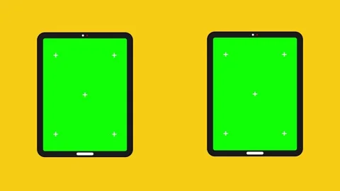 Tablet with Green Screen and Tracking Points on Yellow Background Stockbeeldmateriaal 334737228