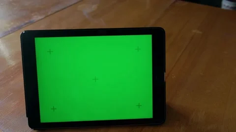 The tablet with the green screen broke and started burning Stock Footage 154209024