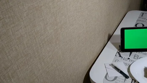 Tablet with green screen in cafe Stock Footage 103112419