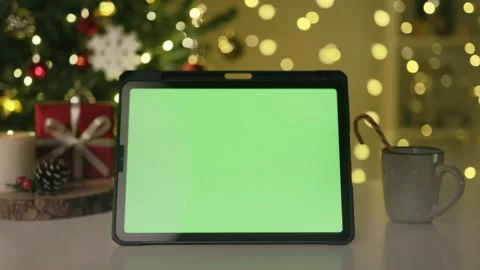Tablet with green screen. chroma key on table in Christmas and happy new year Video stock 220951366