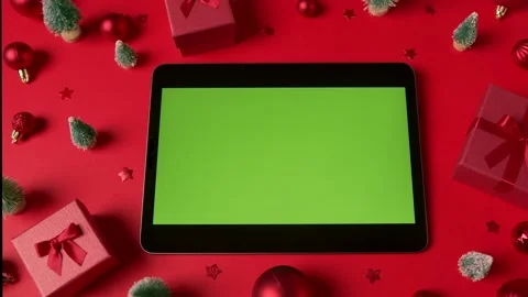 Tablet with green screen. Chroma key. Horizontal position. Top view. Christma Stock Footage 220951493