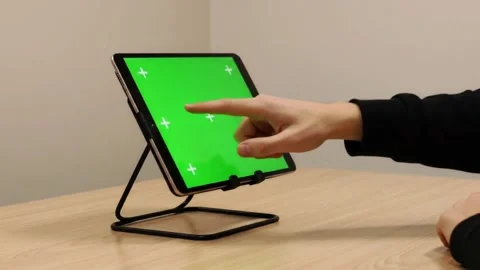 Tablet Green Screen Interaction Close-Up 4K Close-up of a hand interacting .. Stock Footage 312076692