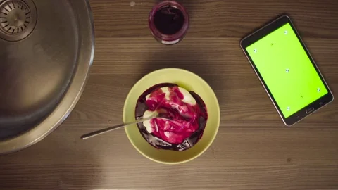 A tablet with green screen on the kitchen table Stock Footage 80607952