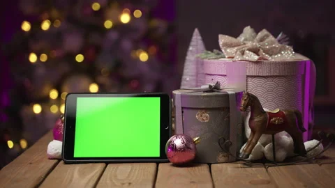 Tablet with green screen for mock-up in the New Year concept with Christmas tree Video stock 166394310