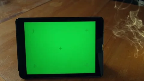 Tablet with the green screen smoke Stock Footage 154416275
