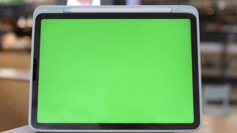Tablet with green screen, used for digital mockups and video overlays Stock Footage 342025320