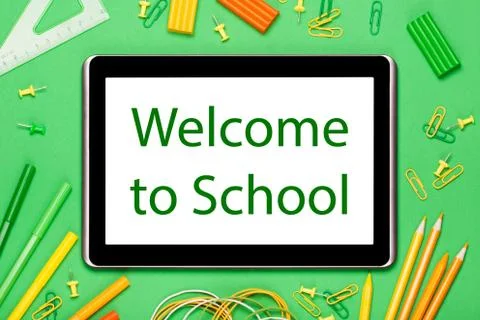 Tablet on a greenery background Stock Photos