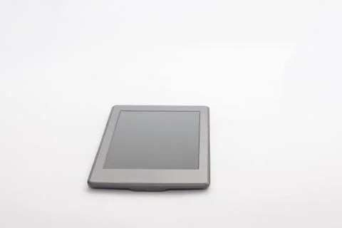 Tablet in a grey background 写真素材