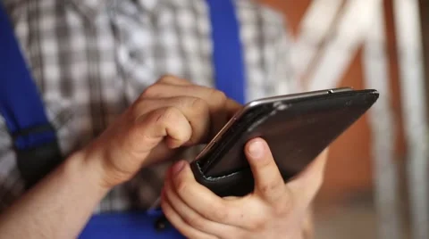 The tablet in the hands of the Builder Stock Footage 61583071