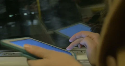 Tablet in Hands of Subway Passenger Stock Footage 57231173