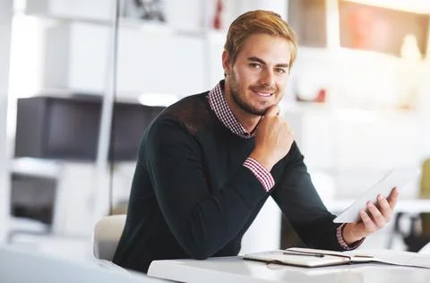 This tablet has really simplified the way I do business. Cropped portrait of a Stock Photos