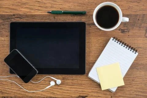 Tablet, headphone, notebook and smart phone with coffee 스톡 사진
