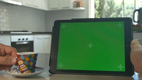 Tablet held by hands Green screen Chroma Key Close up Tracking motion Coffee 4K Stock-Footage 82174781