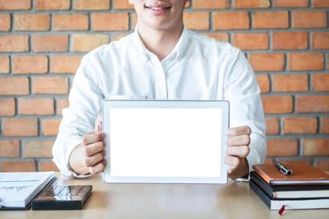 Tablet horizontal screen mockup, Image of Young man holding digital tablet sh Stock Photos
