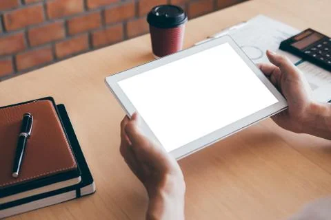 Tablet horizontal screen mockup, Image of Young man working in front of the d Stock Photos