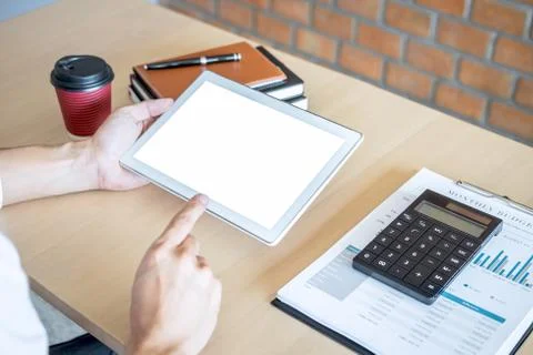 Tablet horizontal screen mockup, Image of Young man working in front of the d Stock Photos