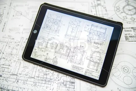 The tablet (ipod) by blueprints engineering project background Stock Photos