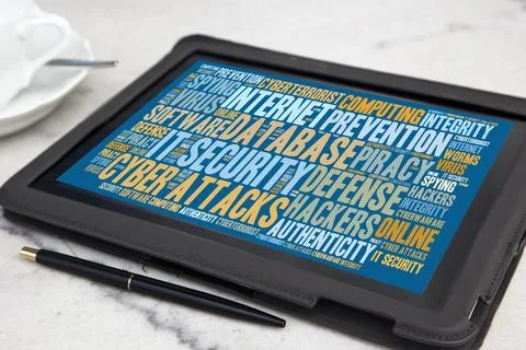Tablet with it security word cloud Stock Photos