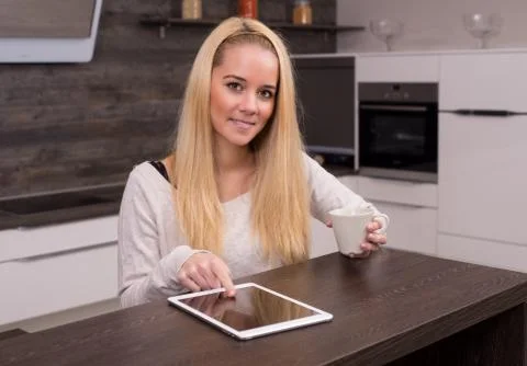 Tablet in kitchen Stock Photos