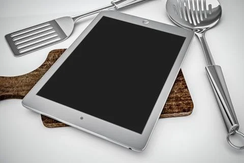 Tablet in kitchen Stock Photos