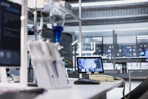 Tablet in lab with app interface showing genetic markers associated with disease Stock Photos