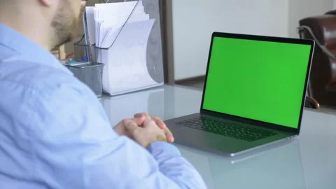 Tablet laptop computer with green screen chroma key display internet business Stock Footage 146319857