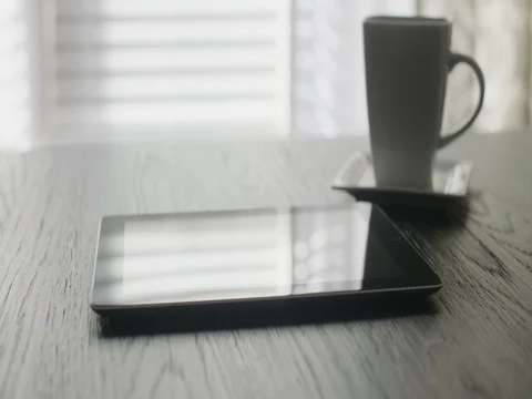 Tablet Low Angle Move Right on Table Video stock 83064235