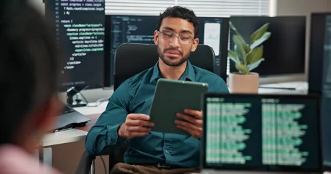 Tablet, man and programmer talking with team for code review, debugging or AI Stock Footage 346948284