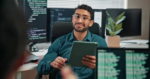 Tablet, man and talking with coding team for code review, bug report joke or Video stock 346946814