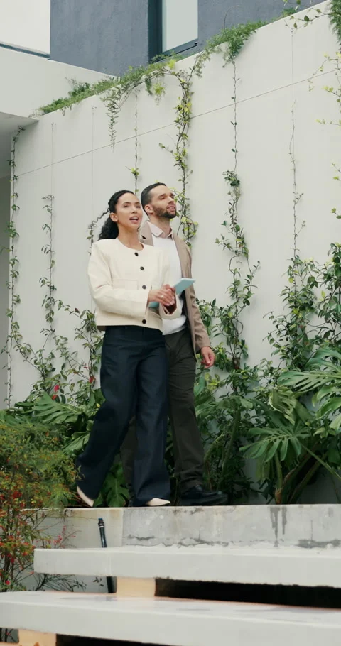 Tablet, man or realtor with backyard tour for exterior features, landscaping or Stock Footage 335315895