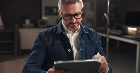 Tablet, media and man on set with research for documentary interview or podcast Stock Footage 303539495