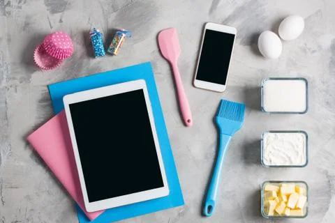 Tablet mobile phone application service website mockup kitchen baking Stock Photos