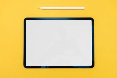 Tablet mock-up on yellow background Stock Photos