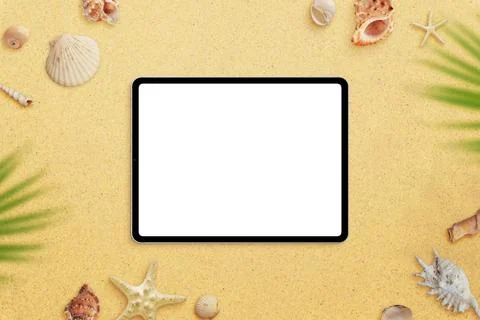Tablet mockup on beach sand surrounded by sea shells and palm leaves. Top vie Stock Photos