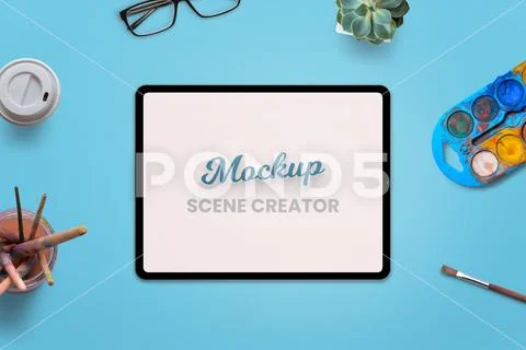 Tablet mockup on desk painting scene creator PSD Template