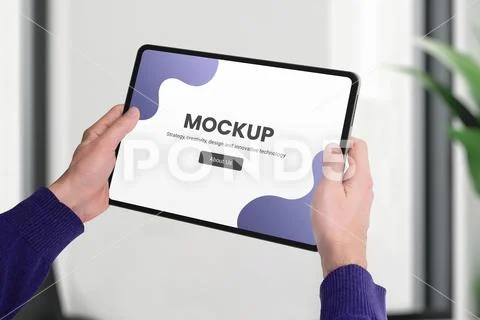 Tablet mockup in man hands close-up PSD Template